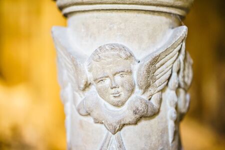 LA RIOJA,SPAIN - 29 AUGUST,2016:Close-up of white stone column with angel bas-relief in Santa Maria...
