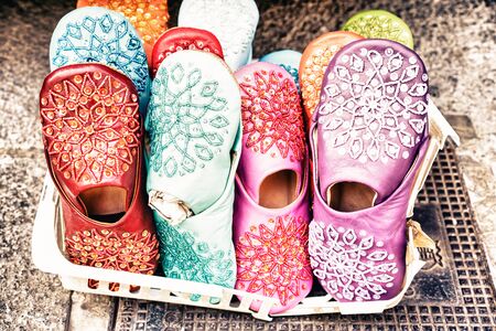 Close-up of bright colorful slippers with decorationsの写真素材