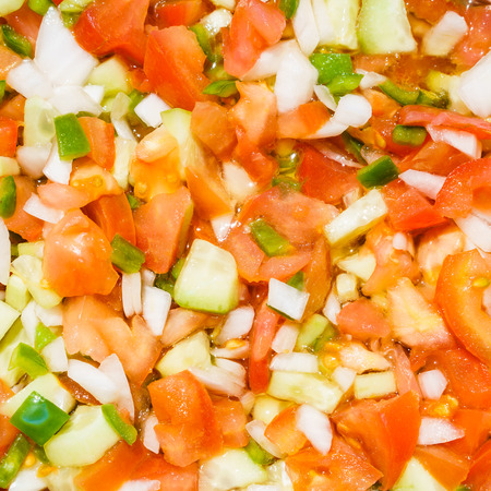 Close-up of fresh cut tomatoes and cucumberの写真素材