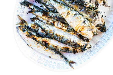 Close-up of heap of grilled fish on plateの写真素材