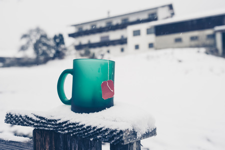 cup of tea in the snowの写真素材
