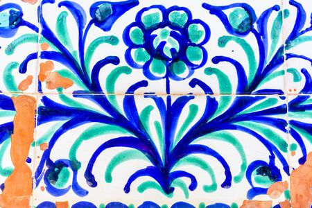 close-up of flower painted on tile wall