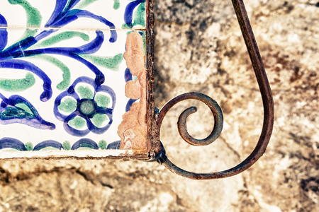 close-up of flower painted on tile wallの写真素材