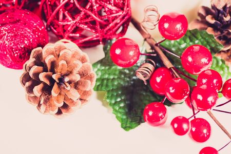 Studio shot of Christmas glittery decorations on wooden table.の写真素材