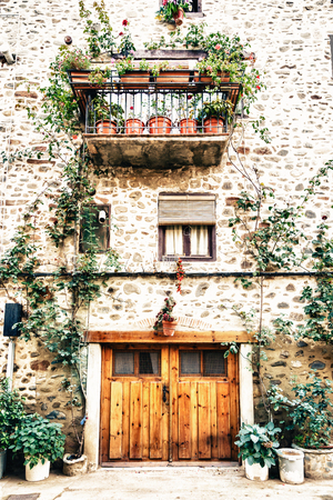 Ezcaray, La Rioja, Spain - 13.11.2016: Empty street in small town. Vertical outdoor shotのeditorial素材