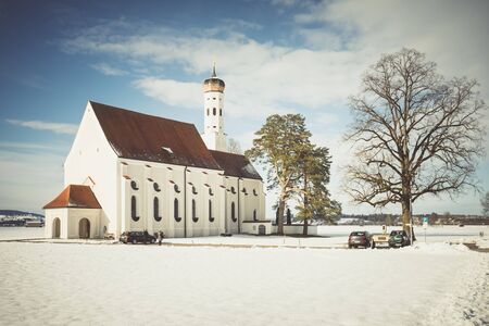 View on winter Saint Coloman in Fussen, Germanyの写真素材
