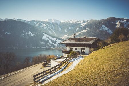 INNSBRUCK, AUSTRIA - MARCH 09: Scenic view on sunny mountain landscape with winter lake on March 09,...