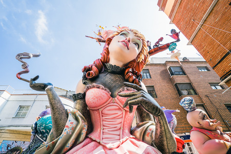 ALZIRA,SPAIN - MARCH 16: Las Fallas,papermache models are constructed then burnt in the traditional celebration in praise of St Joseph on March 16,2017 in Alzira,Valencia,Spain.のeditorial素材