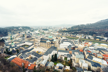 Beautiful aerial view on rooftops of Salzburg,Austria in cloudy dayの写真素材