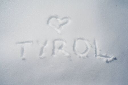 Tyrol written on snow surfaceの写真素材
