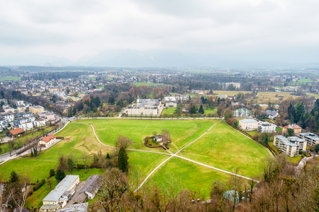 Beautiful aerial view on rooftops of Salzburg,Austria in cloudy dayの写真素材