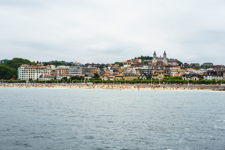 San Sebastian, Spain - 07.30.2016 - Shot from water on city beach.のeditorial素材