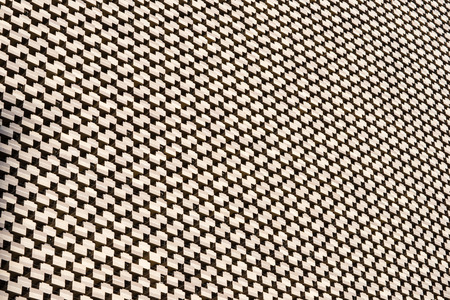 The ornamental brick facade of the building texture background.の写真素材