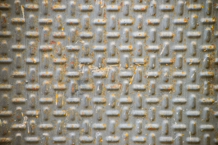 Aged corrugated gray metal floor texture pattern.の写真素材