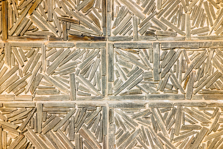 The wall with the abstract placed rough planks in it.の写真素材