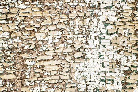 The wall with the gray rough mosaic shatters.の写真素材