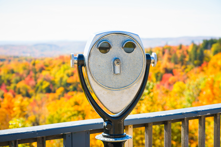 Metal binoscope directed to picturesque forest in Battleboro, Vermont, USA. Horizontal outdoors shotの写真素材