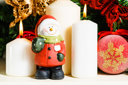 Close up of glittery Christmas decorations on light surface. の写真素材