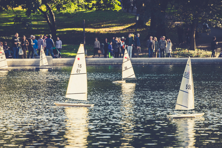 Central Park, New York, USA - 23 October, 2016: small ships sailing in pond.のeditorial素材
