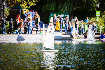 Central Park, New York, USA - 23 October, 2016: small ships sailing in pond.のeditorial素材