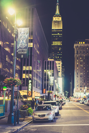 New York, USA - 24 October, 2016: View to night avenue. Vertical outdoors shotのeditorial素材