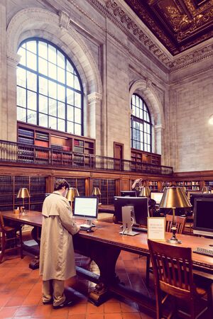 New York Public Library, New York, USA - 22 October, 2016: people browsing computer in libraryのeditorial素材