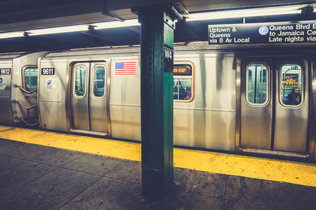 New York, USA - 22 October, 2016: Subway car closing doors at platform.のeditorial素材