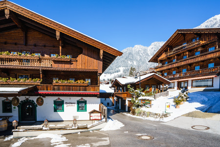 ALPBACH, AUSTRIA - MARCH 09: typical wooden houses on March 09, 2016 in Alpbach, Tyrol, Austria.のeditorial素材
