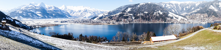 Scenic view on sunny mountain landscape with winter lake in Zell am see, Austriaの写真素材