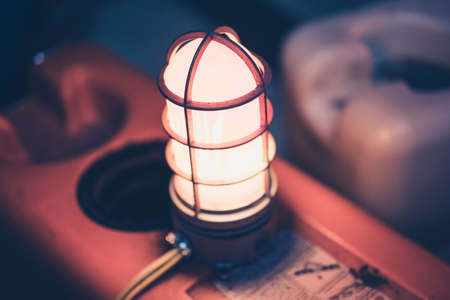 Panel with glowing lantern on blurred .の写真素材