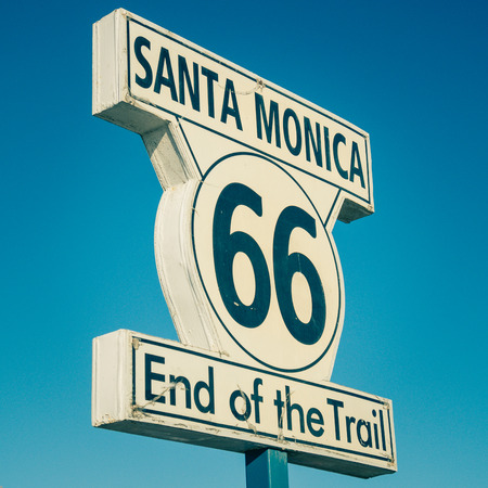 LOS ANGELES, USA - SEPTEMBER 20: Route 66 sign in Santa Monica beach on September 20, 2015 in Los...