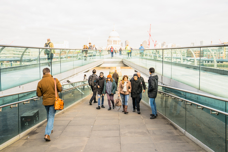LONDON, UK - 17 FEBRUARY, 2017: Millenium Bridge is a steel suspension bridge for pedestrians crossing the River Thames in Londonのeditorial素材