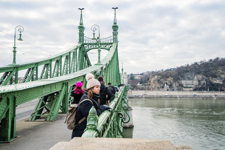 BUDAPEST, HUNGARY - DECEMBER 18, 2017: Szabadsag hid (Liberty Bridge) connects Buda and Pest across the River Danube.のeditorial素材
