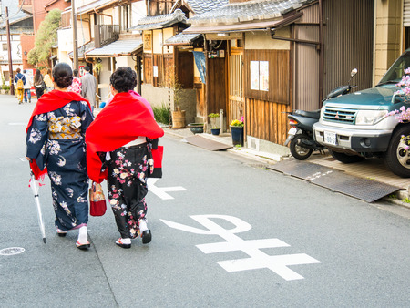 KYOTO, JAPAN - MARCH 24: Unidentified Japanese ladies with Kimono dress, Japanese traditional costume on March 24, 2015 in Kyoto, Japan.のeditorial素材