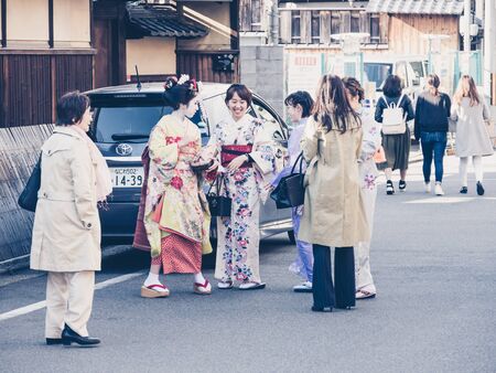 KYOTO, JAPAN - MARCH 24: Unidentified Japanese ladies with Kimono dress, Japanese traditional costume on March 24, 2015 in Kyoto, Japan.のeditorial素材