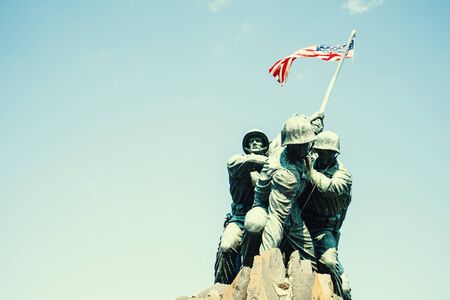 US Marine Corps War Memorial in Washington DC, USA - 16 October, 2016: Statue of soldiers putting flagのeditorial素材