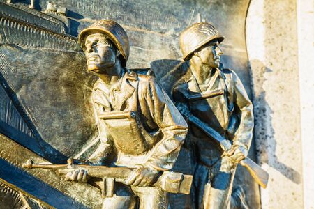 World War II Memorial in Washington DC, USA - 15 October, 2016: Spldiers figurines on memorial.のeditorial素材