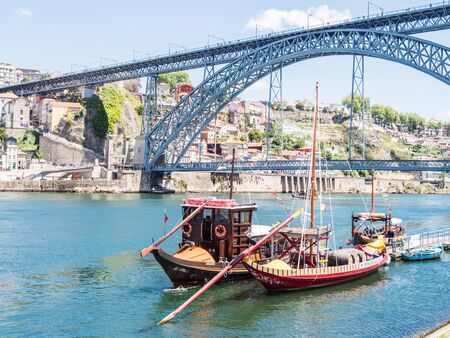 PORTO, PORTUGAL - JUNE 11, 2019: Luis I bridge and Douro river. It is the second-largest city in...