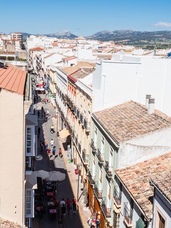 RONDA, SPAIN - MAY 10, 2019: La Bola Street in Ronda, Malaga, Spain.  Its population is approximately 35,000 inhabitants.のeditorial素材