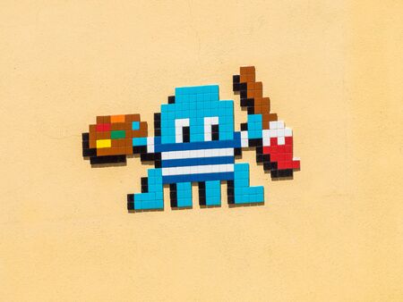 MALAGA, SPAIN - AUGUST 16, 2018: Pacman mosaic in a streetのeditorial素材