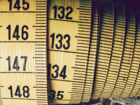Yellow tape measure close up