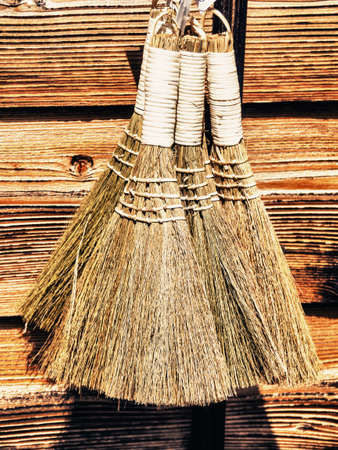 Old broom in a streetの写真素材