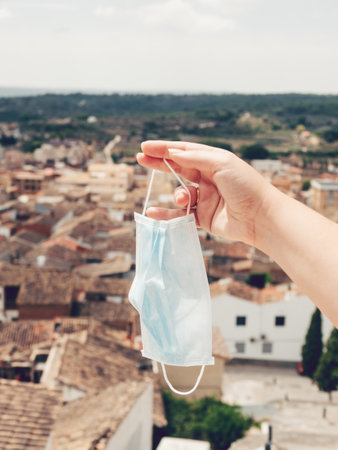 Woman holding a mask, Navarres village in Valencia, Spainの写真素材