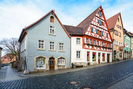 ROTHENBURG OB DER TAUBER, GERMANY - MARCH 05: Typical street on March 05, 2016 in Rothenburg ob der Tauber, Germany. It is well known for its well-preserved medieval old town.のeditorial素材