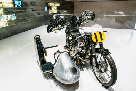 MUNICH, GERMANY - MARCH 15: BMW cars and motorcycle at the BMW Museum and Welt on March 15, 2016 in Munich, Germany. The company was founded in 1916.のeditorial素材