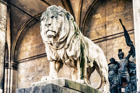 MUNICH, GERMANY - MARCH 14 2016: Famous lion statue in Odeonplatzのeditorial素材