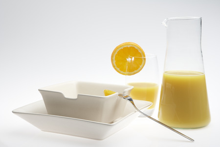 breakfast orange juice isolated white backgroundの写真素材