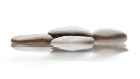 stones isolated on waterの写真素材