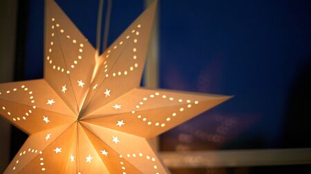 Close up Xmas light decoration on the windowの写真素材