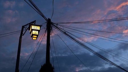 Street lamp in Ohrid, Republic of Macedonia. Messy wires on the background sunset time.の写真素材
